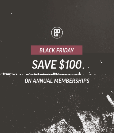 Black Friday promotion image for Minneapolis Indoor Climbing Gym Bouldering Project with “Save $100 on annual memberships” on a dark textured background and a small circular logo at the top.