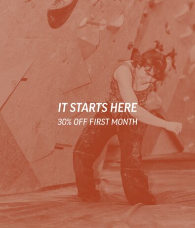 A person in climbing gear stands in front of an indoor climbing wall. Overlaid text reads: IT STARTS HERE 30% OFF FIRST MONTH. The image has a red color filter.