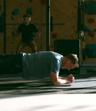Man doing plank at Boston Bouldering Project
