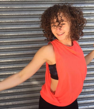 Group fitness instructor Sarah Strupp-Levitsky at DC Bouldering Project. Sarah teaches energetic fitness classes.