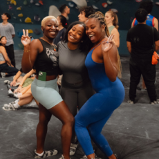 Climbers smiling for a photo at Bouldering Project Brooklyn