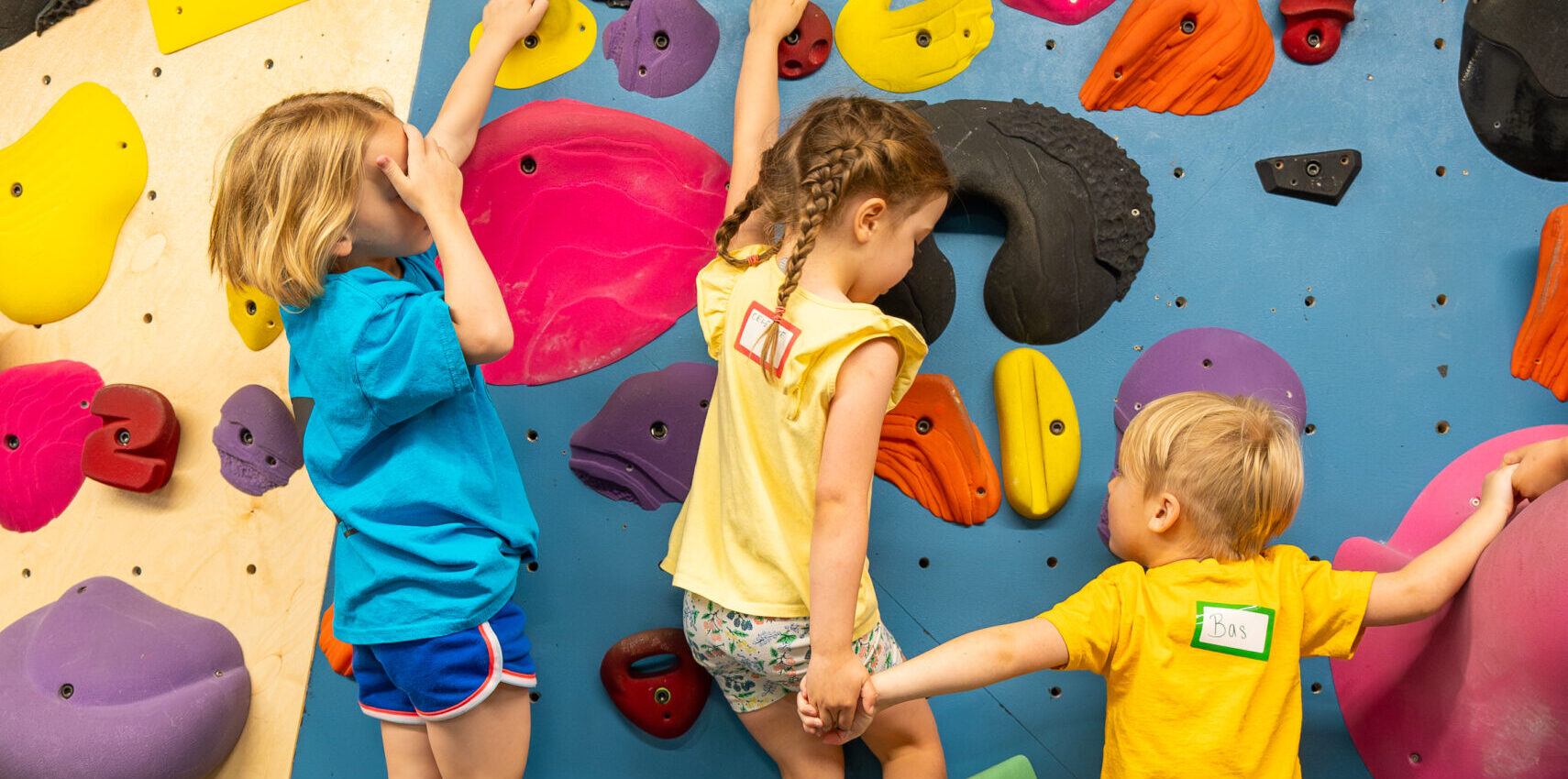 Kids at DC Bouldering Project climbing