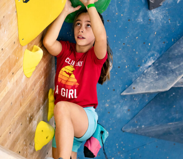 Kid rock climbing at DC Bouldering Project