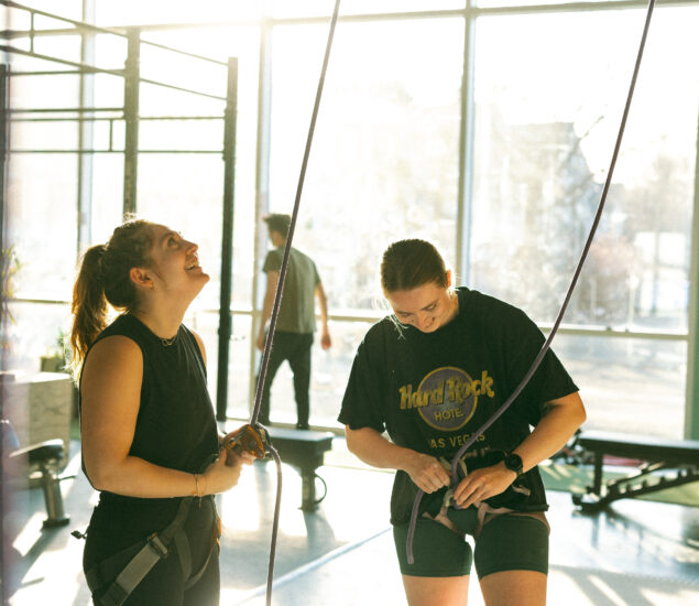 People rock climbing at Bouldering Project