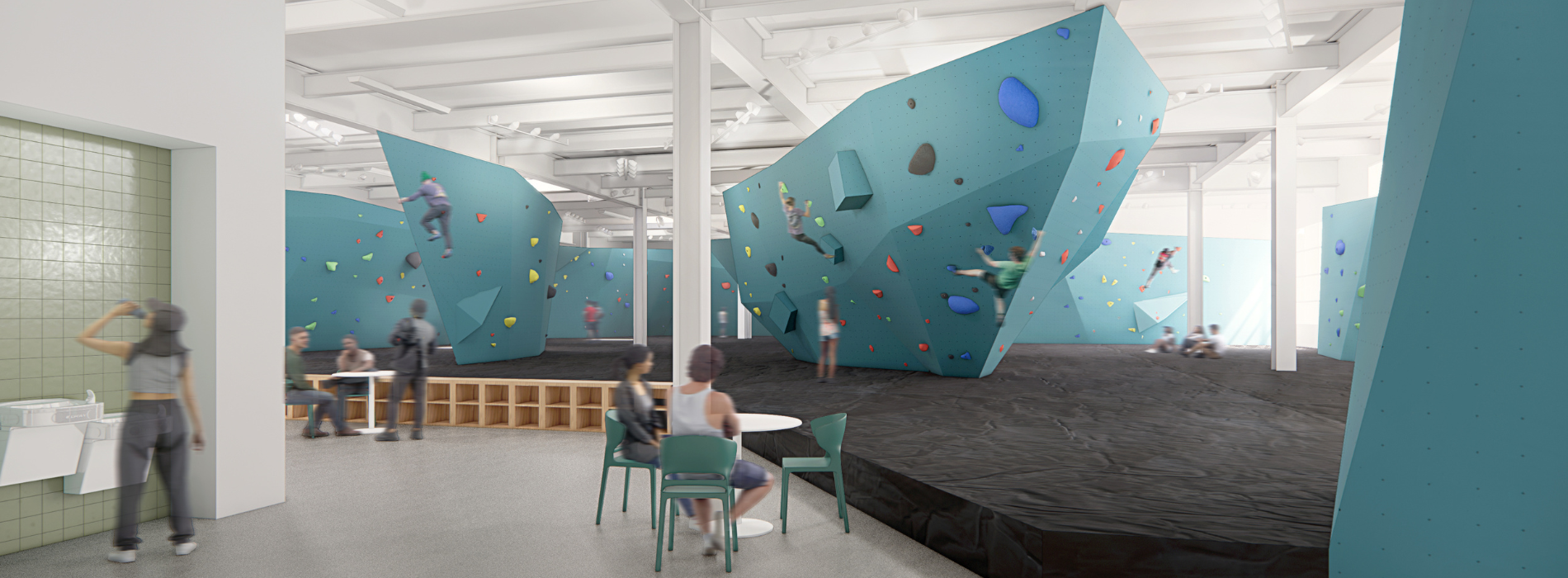 Indoor bouldering gym with blue climbing walls, black mats, and people climbing or relaxing at tables. Some watch or prep to climb. This bright dc climbing gym features high ceilings and striking white beams.