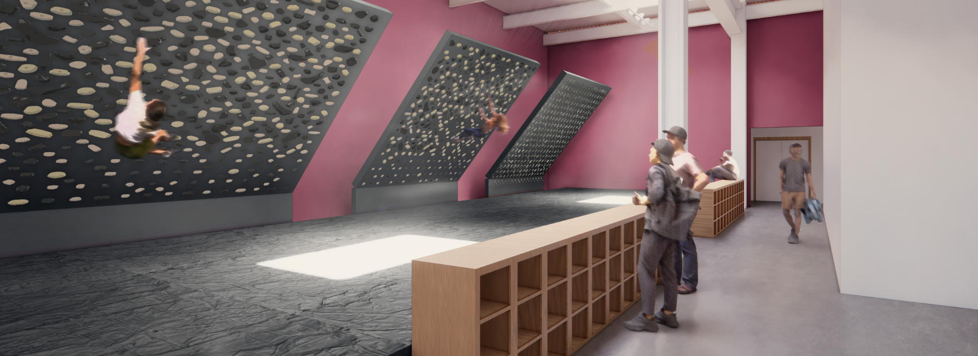People climb on angled indoor bouldering walls with multicolored holds at a DC climbing gym, while others watch and stand by wooden cubbies in a spacious gym with pink walls and padded flooring.