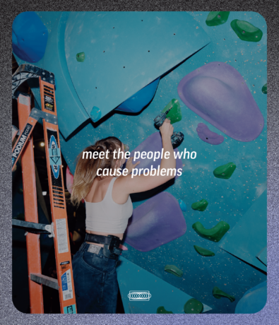 A person on a ladder attaches a climbing hold to a blue bouldering wall, captured in a marketing strategy image with the text meet the people who cause problems overlaid.