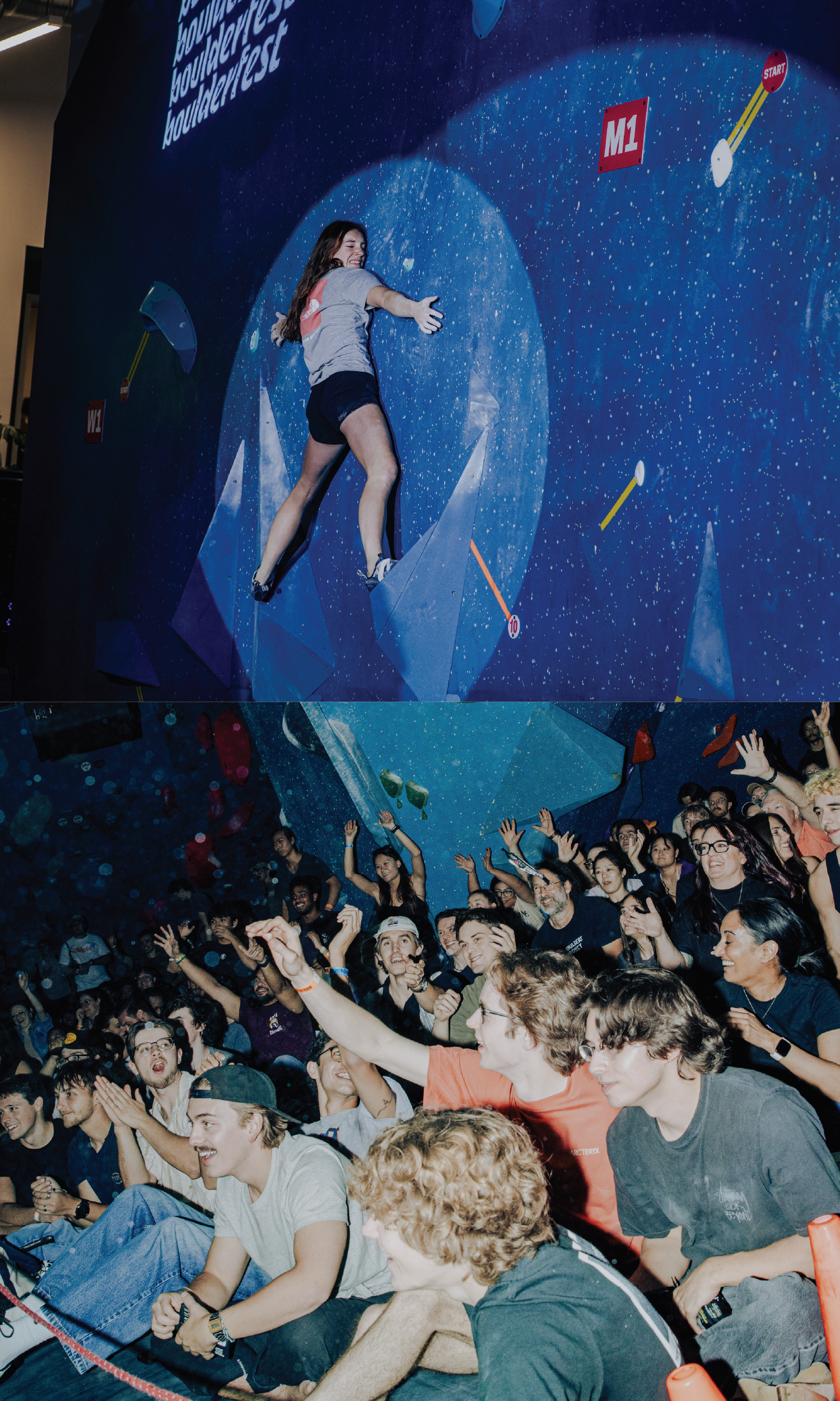 A rock climber fueled by joyful obsession scales a blue wall during a competition, viewed by a cheering crowd below.